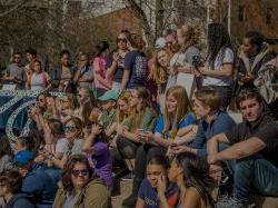 group of students sitting in the quad