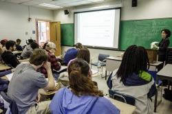 Scene of a history faculty member teaching a class.