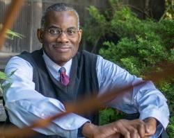 Photo of a history faculty member, Leslie Wilson, in an outdoor setting.