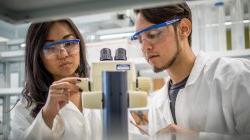 students in lab using microscope